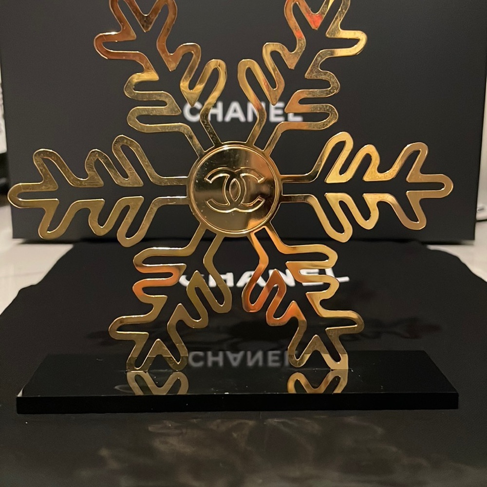 Chanel Snow Flake cosmetic display. The covered display Sold separately.
